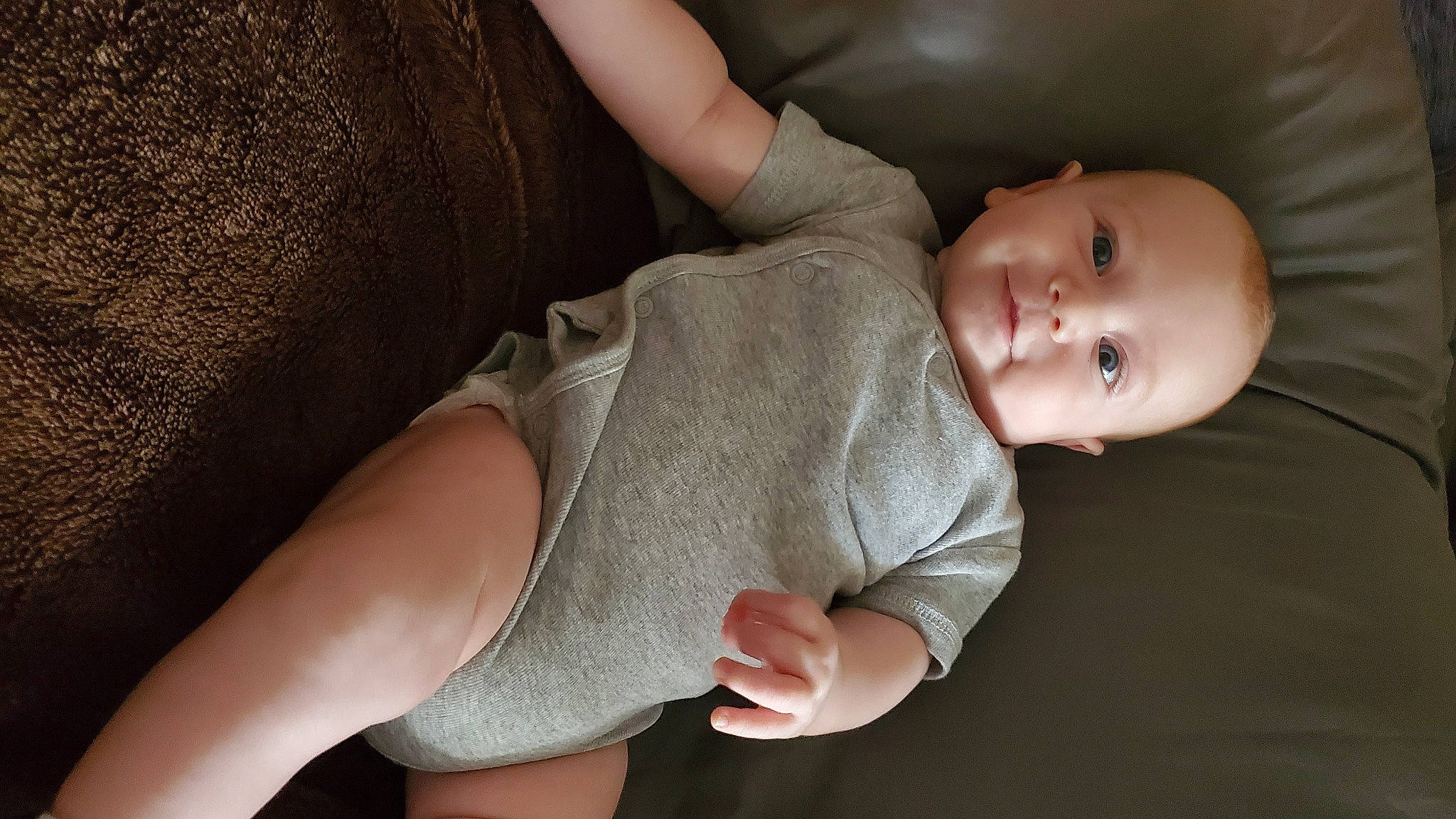 Josiah is registered to the contest to win money with this photo: baby, baby_toddler_clothing, cheek, child, comfort, elbow, finger, flash_photography, gesture, hand, human_body, joint, knee, leg, mouth, nail, person, skin, sleeve, thigh