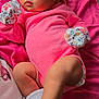 baby, infant, pink_clothing, headband, mittens, white_socks, blanket, lying_down, cute, chubby_cheeks, indoors, soft_fabric, newborn, portrait, resting, baby_girl, cozy, sleepwear, baby_fashion, comfortable