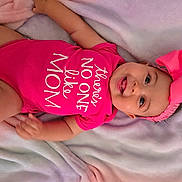 Kaori Hinata Delgado joined the competition — help win amazing prizes! baby, child, pink_onesie, headband, bow, smiling, tongue_out, blanket, infant, cute, happy, portrait, lying_down, soft_texture, fabric, clothing, face, person, baby_girl, playful