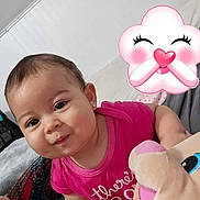Kaori Hinata joined the competition — help win amazing prizes! baby, blanket, cartoon_sticker, child, colorful, cozy, cute, expression, face, hand, indoors, infant, person, pink_shirt, playful, plush_toy, smiling, soft_toy, toy, young