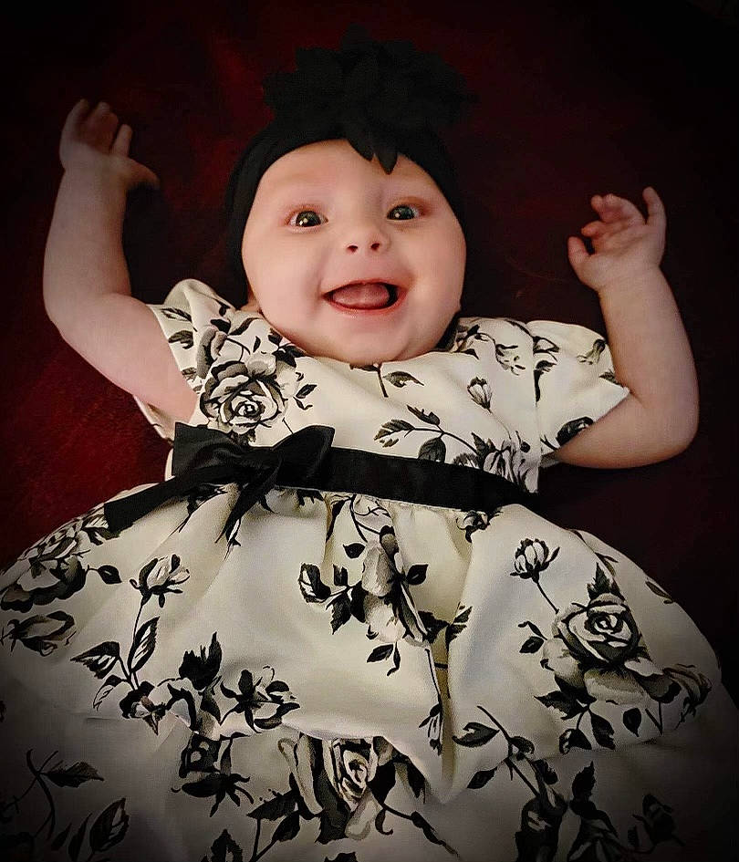 Sabrina joined the competition — help win amazing prizes! baby, baby_toddler_clothing, cool, dress, facial_expression, finger, flash_photography, gesture, happy, headwear, lip, neck, outerwear, person, pink, skin, sleeve, smile, standing, t_shirt