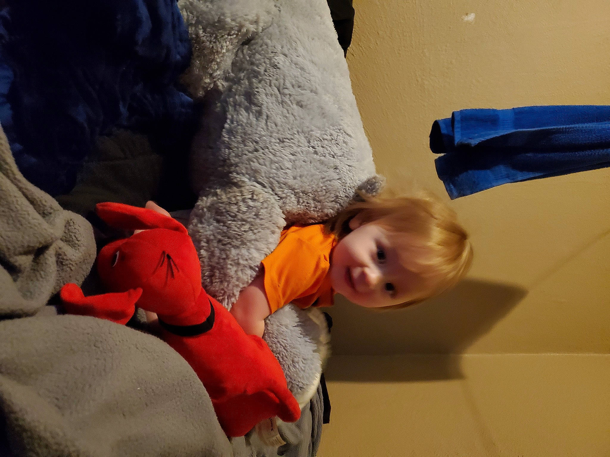 Ivan is registered to the contest to win money with this photo: adventure, baby, carmine, child, comfort, fun, happy, landscape, leisure, linens, orange, person, recreation, rock, sitting, toddler, tree, vacation, winter