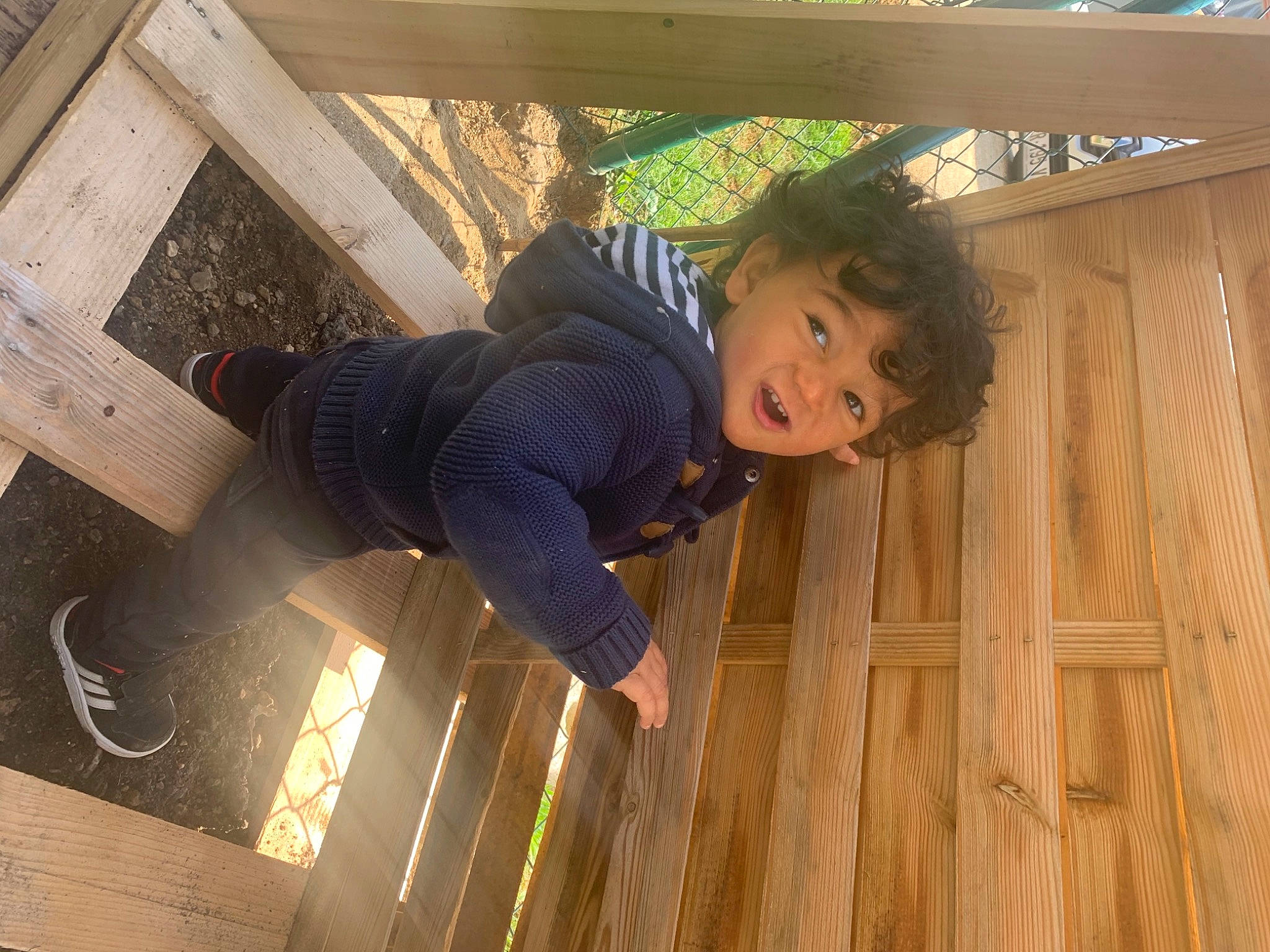 Marvyn participe au concours pour gagner de l'argent avec cette photo : baby_toddler_clothing, child, door, floor, flooring, fun, happy, hardwood, leisure, pattern, person, room, tints_and_shades, toddler, varnish, window, wood, wood_flooring, wood_stain