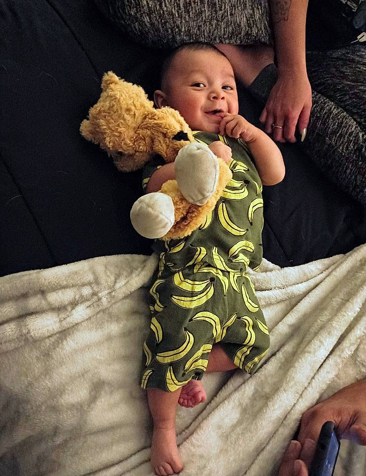 Dax joined the competition — help win amazing prizes! baby_toddler_clothing, barefoot, child, comfort, finger, foot, fun, hairstyle, happy, head, human_leg, nail, person, sitting, skin, stuffed_toy, textile, thigh, thumb, toddler