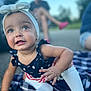 Brexley joined the competition — help win amazing prizes! baby, child, toddler, headband, bow, blue_sky, outdoor, blanket, crawling, star_pattern, clothing, person, face, happy, sock, footwear, summer, nature, blurred_background, casual