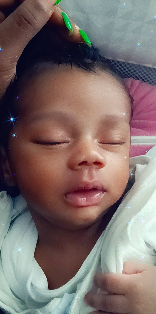 Benjamin Jr. is registered to the contest to win money with this photo: baby, cheek, chin, ear, eyebrow, eyelash, facial_expression, forehead, gesture, hairstyle, happy, human, iris, jaw, lip, mouth, neck, nose, person, skin