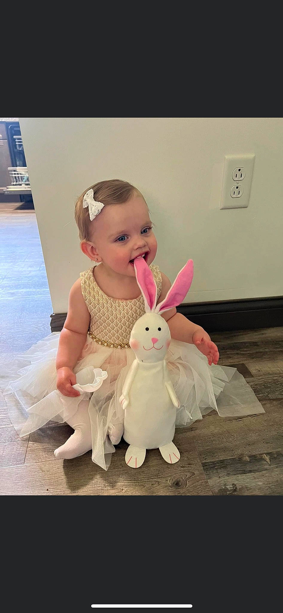 Oaklynn joined the competition — help win amazing prizes! baby, baby_toddler_clothing, child, ear, fashion_accessory, fawn, flooring, fur, gesture, happy, mythical_creature, person, pink, rabbit, rabbits_and_hares, sitting, smile, stuffed_toy, tail, toddler