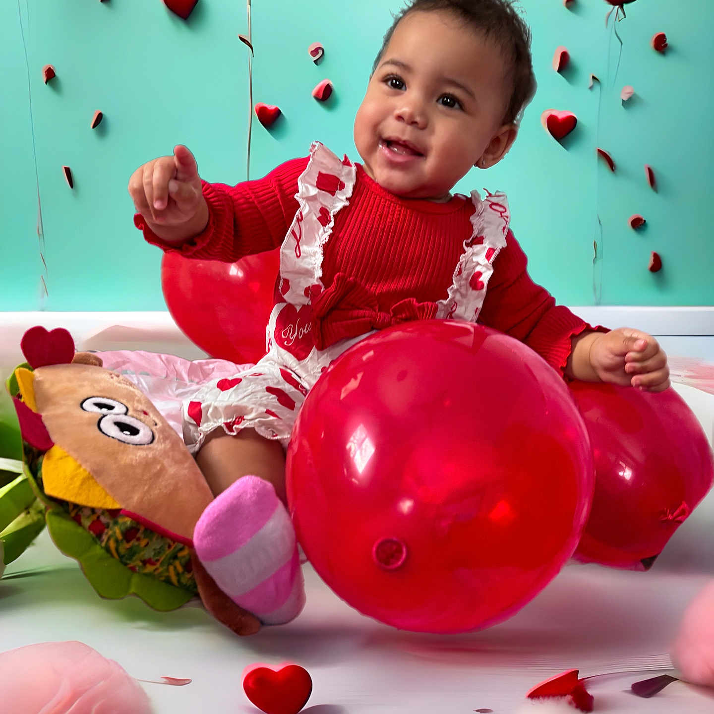 Empress is registered to the contest to win money with this photo: baby, balloon, bodypart, clothing, couch, face, finger, flower, glove, hand, head, inflatable, people, person, photography, plant, portrait, rose, sitting, sphere