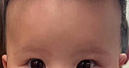 Brixton joined the competition — help win amazing prizes! baby, face, chubby_cheeks, spiky_hair, portrait, infant, cute, close_up, skin, eyes, person, head, child, adorable, expression, young, human, indoors, looking_at_camera, mouth