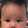 baby, face, chubby_cheeks, spiky_hair, portrait, infant, cute, close_up, skin, eyes, person, head, child, adorable, expression, young, human, indoors, looking_at_camera, mouth