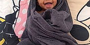Samantha joined the competition — help win amazing prizes! baby, blanket, cartoon, child, colorful, cozy, cute, expression, face, happy, indoors, infant, lying, person, portrait, smiling, soft, towel, wrapped, young