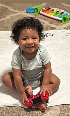 Alonso-amir joined the competition — help win amazing prizes! baby, baby_toddler_clothing, carmine, cheek, child, eye, flooring, fun, happy, joy, leisure, person, play, sitting, sleeve, smile, snapshot, t_shirt, thumb, toddler