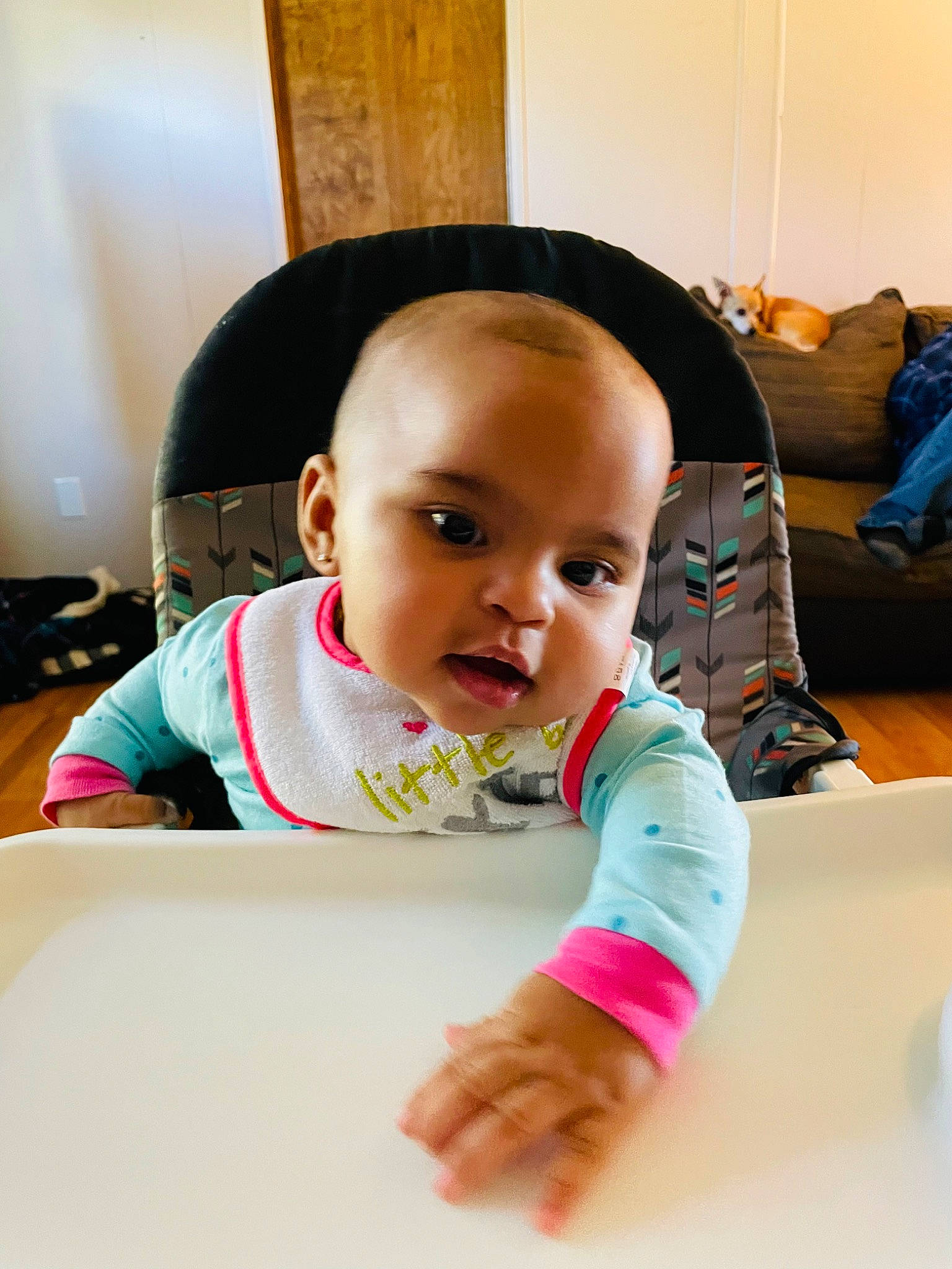 Jaslynn joined the competition — help win amazing prizes! baby, baby_toddler_clothing, cheek, child, comfort, couch, eye, finger, flooring, fun, hairstyle, happy, leisure, person, room, sitting, skin, sleeve, t_shirt, table