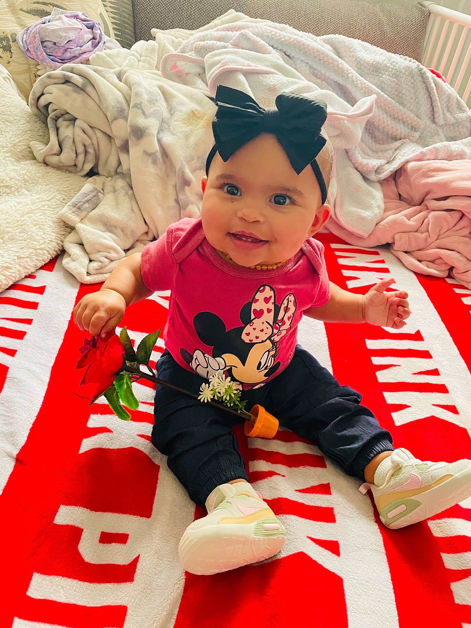 Jaslynn joined the competition — help win amazing prizes! baby, baby_toddler_clothing, carmine, child, design, event, flooring, font, happy, headwear, holiday, joy, linens, pattern, person, pink, room, sitting, sleeve, smile