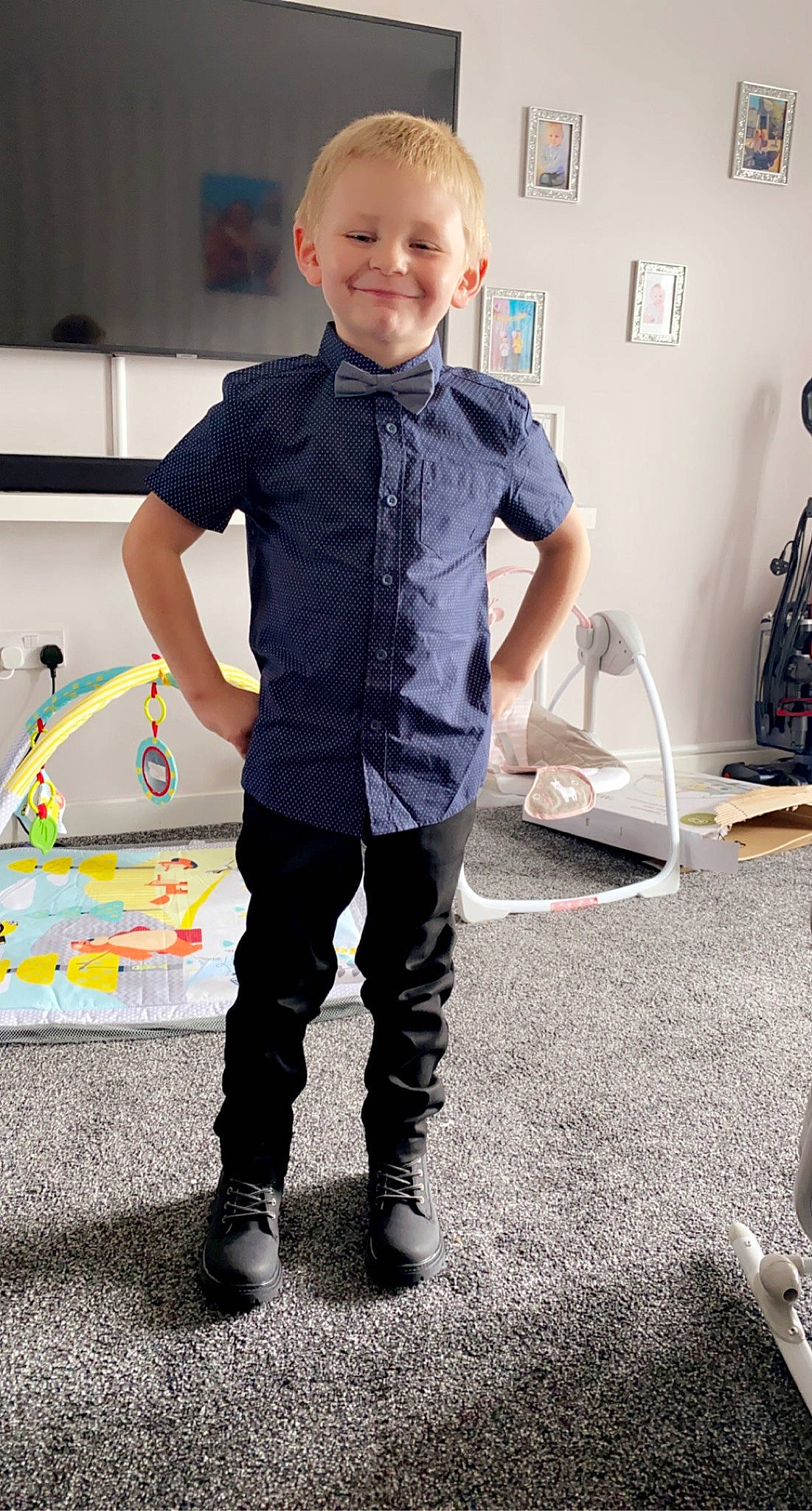 Kyle Hammond is registered to the contest to win money with this photo: child, cool, denim, dress_shirt, electric_blue, floor, flooring, fun, hairstyle, happy, human_leg, joint, joy, knee, leisure, pattern, person, sleeve, smile, sneakers