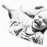 baby, black_and_white, child, closeup, clothing, cute, expression, face, happy, high_key, joy, laughing, lying_down, monochrome, patterned_shirt, person, portrait, smile, toddler, young