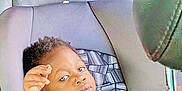 Ramaria joined the competition — help win amazing prizes! toddler, child, car_seat, blue_eyes, leather_seat, car_interior, seatbelt, young_child, baby, face, person, portrait, sitting, curious, infant, automobile, window, hair, clothing, seat