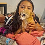 Brooklin joined the competition — help win amazing prizes! animal, bed, blanket, casual, child, clothing, comfort, cuddling, dog, face, hair, hand, headphones, indoor, pet, portrait, relaxation, room, water_bottle, young_girl