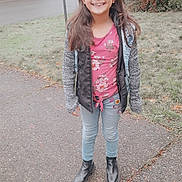 Brooklin is registered to the contest to win money with this photo: boots, casual_clothing, child, daylight, girl, grass, happy, house, jacket, jeans, long_hair, nature, outdoor, person, portrait, residential_area, sidewalk, smile, street, trees