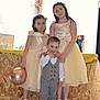 child, children, boy, girls, dress, suit, balloon, party, celebration, formalwear, indoor, smile, happy, family, event, floor, table, decoration, portrait, cute