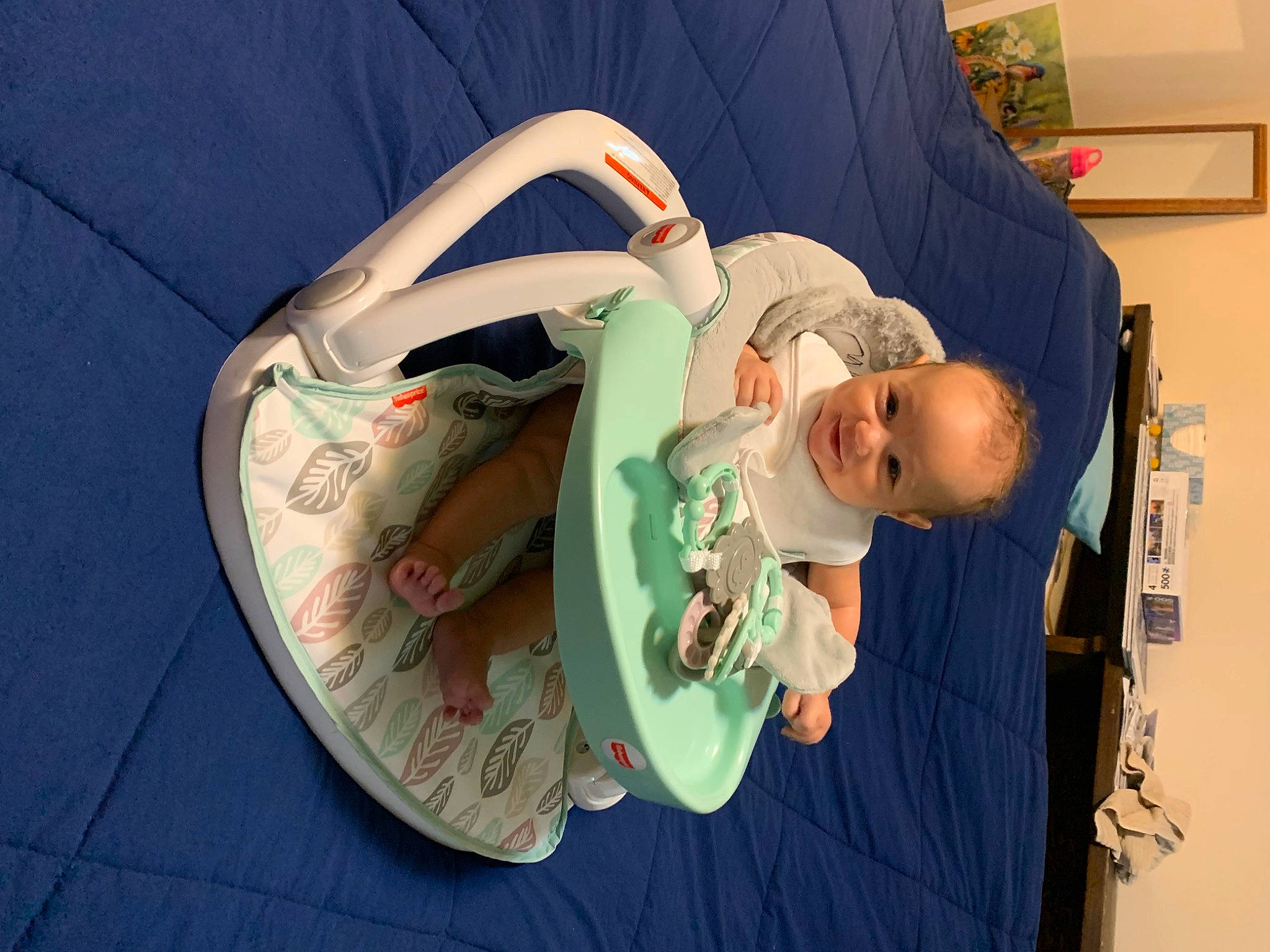 Dani is registered to the contest to win money with this photo: baby, baby_products, baby_safety, baby_toddler_clothing, chair, child, circle, comfort, fashion_accessory, fun, happy, hat, leisure, person, personal_protective_equipment, room, sitting, t_shirt, toddler