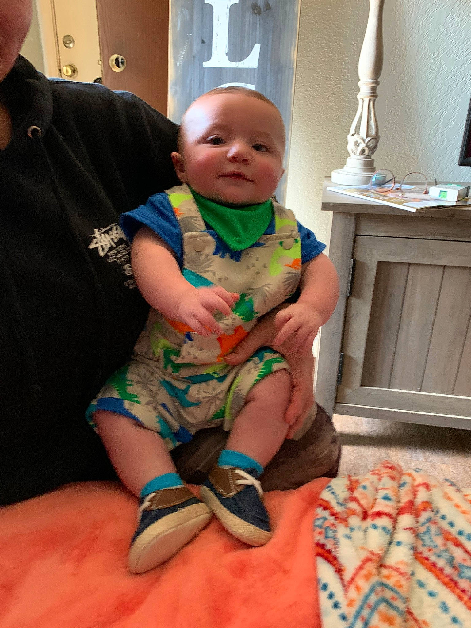 Canyon is registered to the contest to win money with this photo: baby, child, finger, person, sitting, skin, smile, toddler