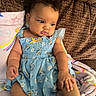 Novaleigh joined the competition — help win amazing prizes! baby, blanket, blue_dress, cartoon_print, child, couch, curious, cute, face, floral_pattern, foot, hand, indoors, infant, person, plush, portrait, reaching, skin, soft_texture