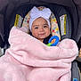 Averly joined the competition — help win amazing prizes! baby, child, blanket, car_seat, headband, bow, toy, smiling, face, infant, pink, soft, cozy, cute, indoor, portrait, person, clothing, closeup, happy