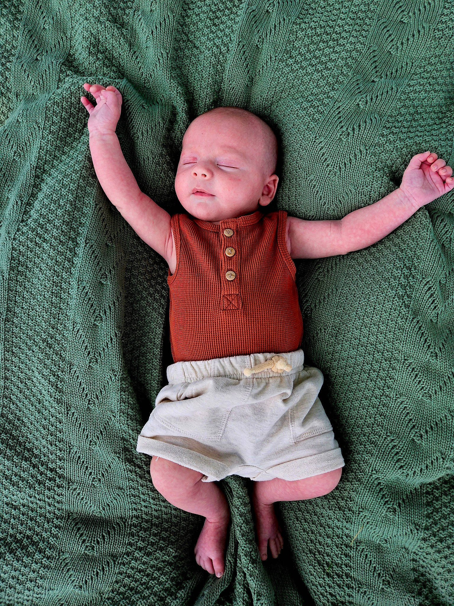 Ledger joined the competition — help win amazing prizes! baby, baby_toddler_clothing, finger, gesture, hand, human_body, joint, linens, magenta, outerwear, pattern, person, pink, product, skin, sleeve, textile, toddler, trunk, waist