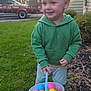 Rhett joined the competition — help win amazing prizes! toddler, child, green_hoodie, bucket, easter_eggs, outdoor, grass, smiling, plastic_eggs, spring, house, sunset, toy, play, happy, person, nature, daylight, vehicle, casual_clothing