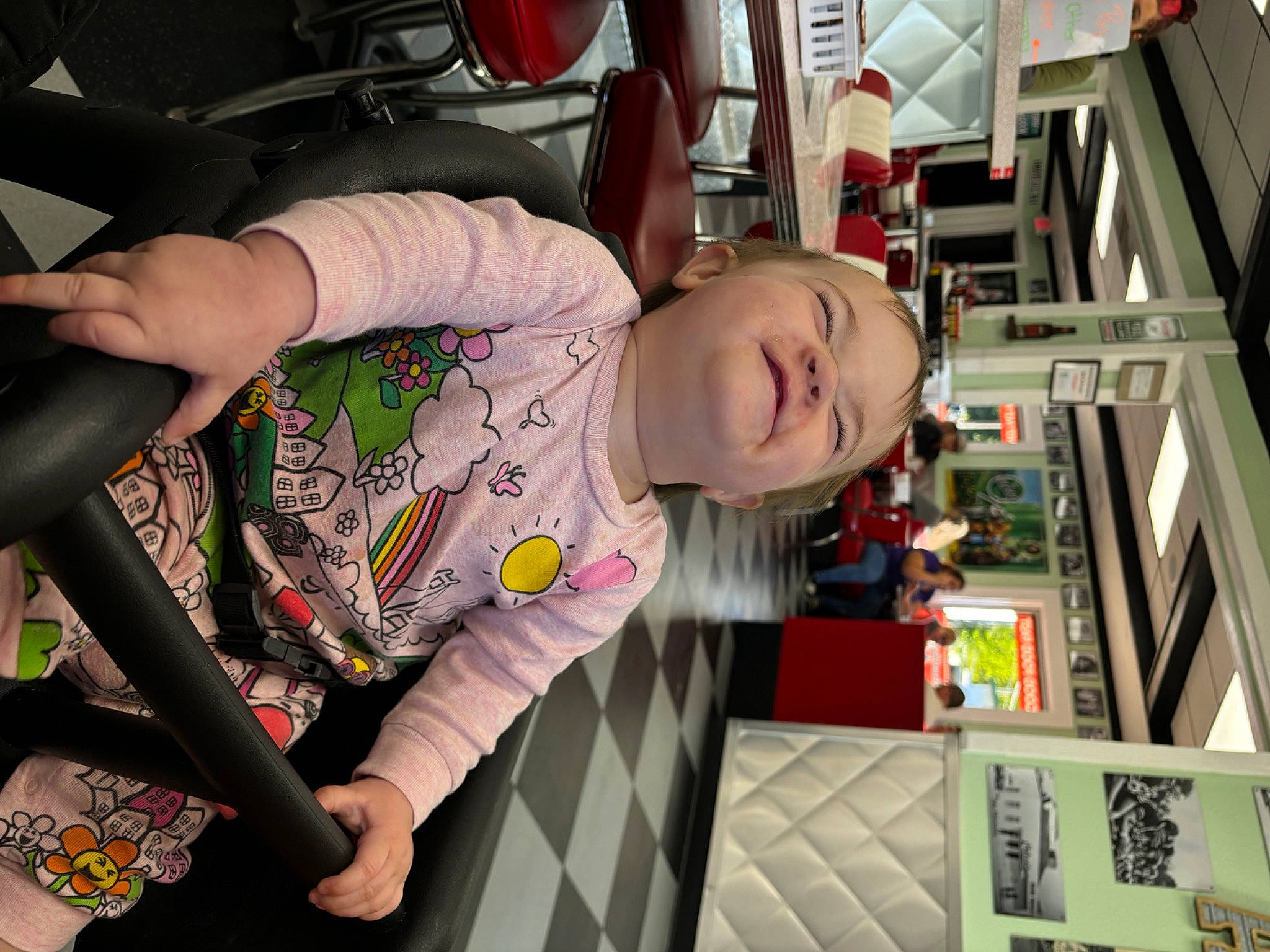 Palmerlynn is registered to the contest to win money with this photo: child, fun, human_leg, pattern, person, plant, play, room, t_shirt, toddler