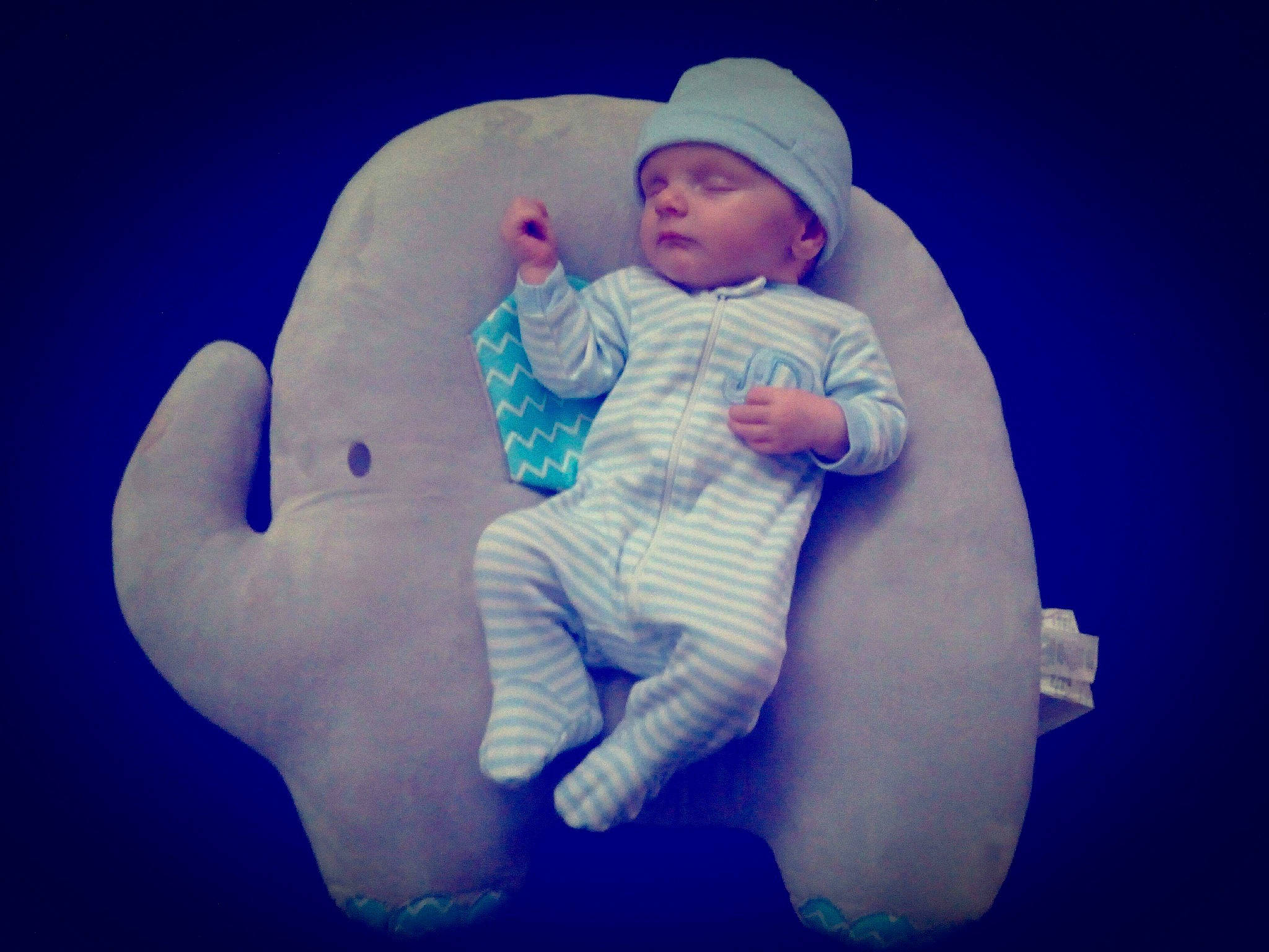 Lucius is registered to the contest to win money with this photo: baby, blue, child, cloud, finger, fun, gesture, hand, headwear, illustration, love, meteorological_phenomenon, person, play, sky, smile, toddler