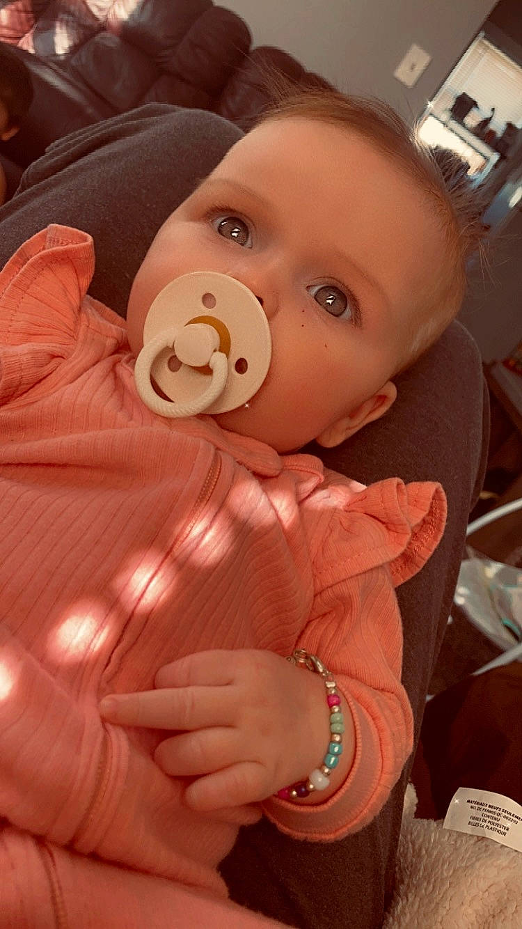 Abby joined the competition — help win amazing prizes! baby, baby_products, baby_toddler_clothing, cheek, child, comfort, eyelash, gesture, jewellery, lip, nail, neck, nose, peach, person, pink, skin, sleeve, thumb, toddler