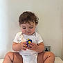 Lucius joined the competition — help win amazing prizes! baby, bathroom, bodypart, clothing, diaper, face, finger, hand, head, indoors, person, photography, portrait, room, sitting, sleeve, t_shirt, toilet, toy, wrist