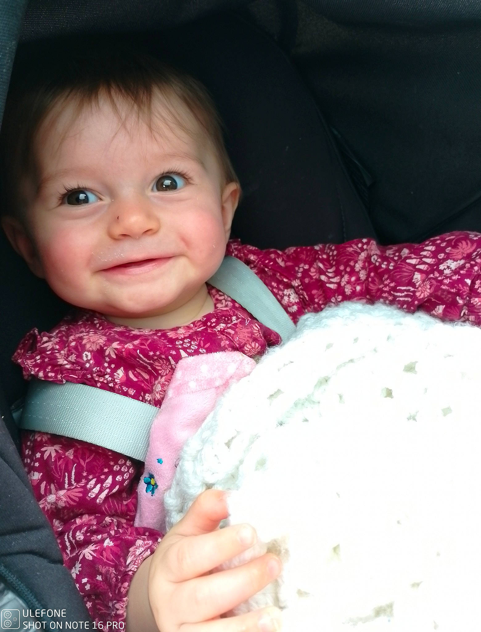 Manon participe au concours pour gagner de l'argent avec cette photo : baby, baby_products, baby_toddler_clothing, cheek, child, comfort, dress, eye, happy, headgear, iris, joy, linens, magenta, nose, pattern, person, sitting, skin, sleeve