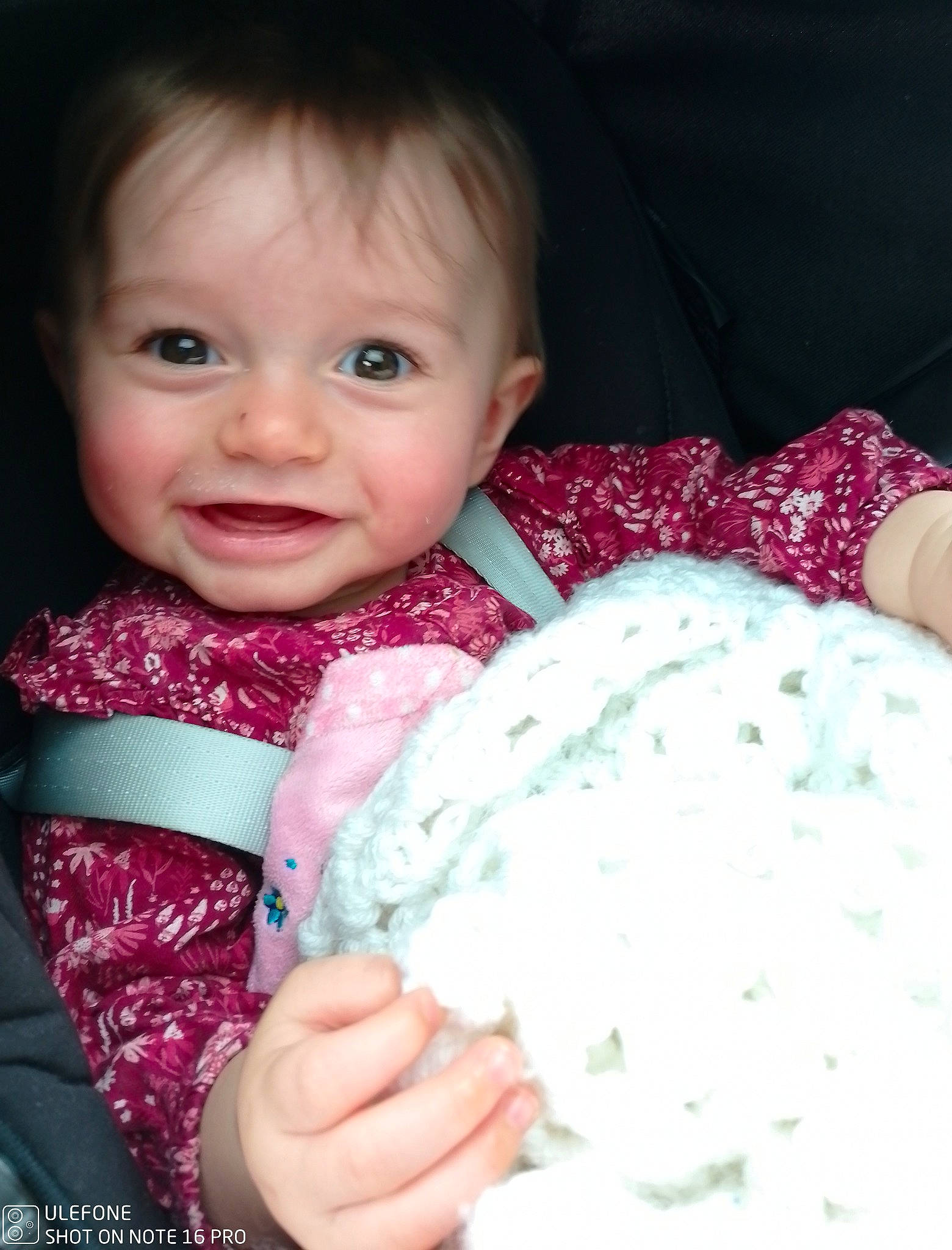 Manon participe au concours pour gagner de l'argent avec cette photo : baby, baby_products, baby_toddler_clothing, cheek, child, dress, finger, happy, iris, joy, linens, magenta, nose, pattern, person, pink, product, skin, sleeve, smile