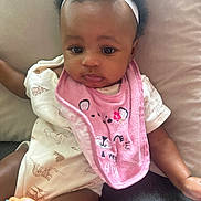 Aleiah joined the competition — help win amazing prizes! accessories, baby, bib, blanket, couch, cushion, face, furniture, happy, head, homedecor, jewelry, necklace, newborn, person, photography, portrait, quilt, sitting, smile