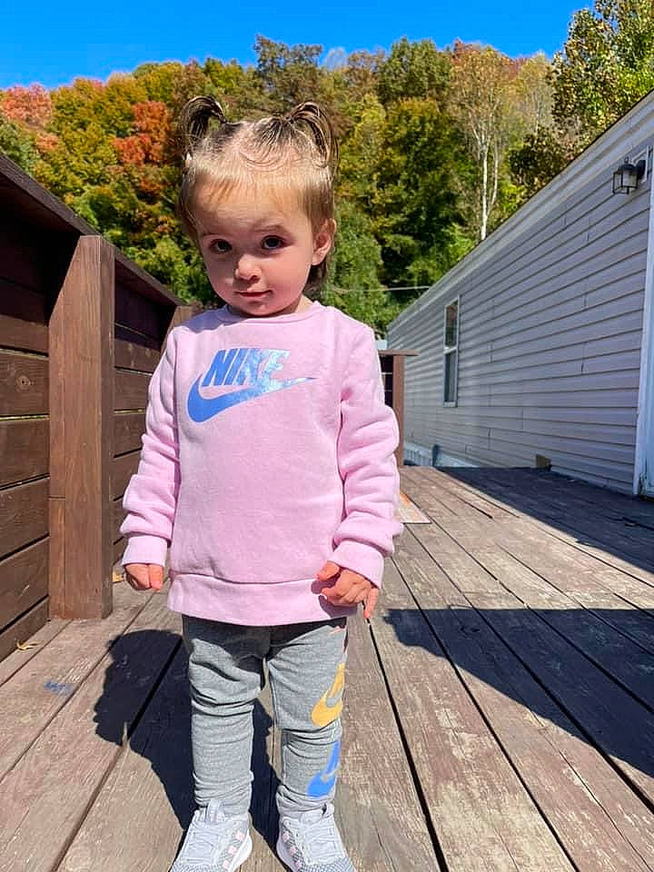Raelynn joined the competition — help win amazing prizes! baby_toddler_clothing, child, clothing, door, electric_blue, fun, grass, happy, leisure, magenta, people_in_nature, person, plant, recreation, sky, sleeve, t_shirt, toddler, tree, waist