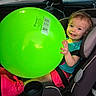 Jocelynne joined the competition — help win amazing prizes! toddler, child, smiling, car_seat, balloon, green_balloon, vehicle, car_interior, parking_lot, outdoor, sitting, seatbelt, pink_shoes, turquoise_shirt, short_hair, face, portrait, happy, travel, family