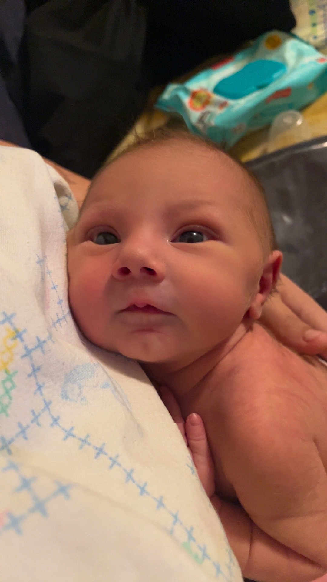 Augustus joined the competition — help win amazing prizes! baby, infant, face, skin, hand, eyes, newborn, closeup, portrait, curious, resting, soft, blanket, pattern, holding, cute, child, human, young, expression
