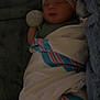 Augustus is registered to the contest to win money with this photo: baby, newborn, sleeping, blanket, hat, hospital, infant, cozy, soft, glove, striped, wrapped, cute, child, face, bed, person, resting, warm, comfort