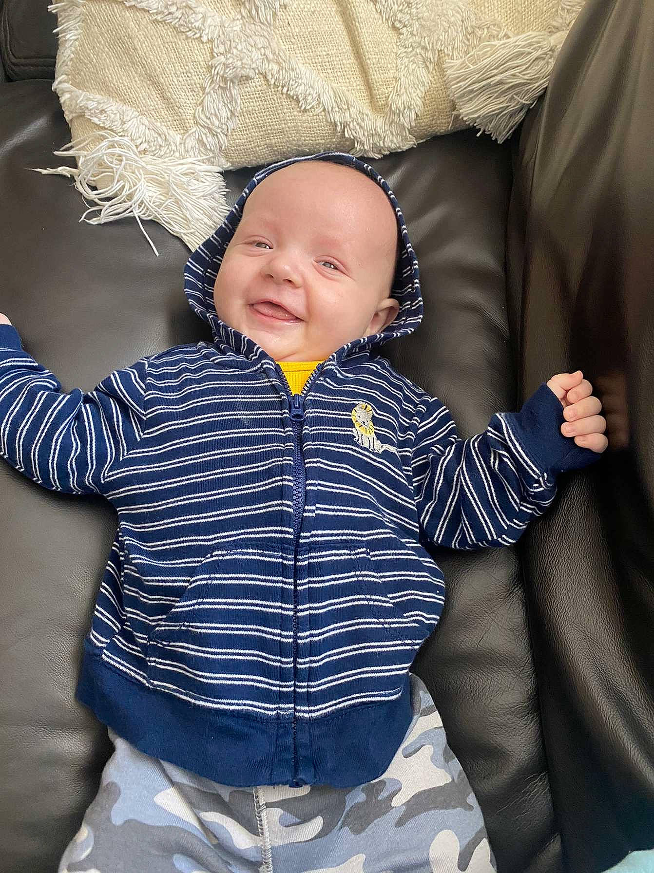 Tj Allan joined the competition — help win amazing prizes! baby, baby_toddler_clothing, cheek, comfort, cool, electric_blue, eye, gesture, happy, head, iris, mouth, outerwear, person, product, purple, sitting, sleeve, smile, textile