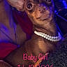 animal, animal_portrait, blue_light, close_up, companion, cozy, cute, dim_light, dog, ear, furry, indoor, looking_at_camera, necklace, pearl_necklace, pet, portrait, purple_light, small_dog, text_overlay