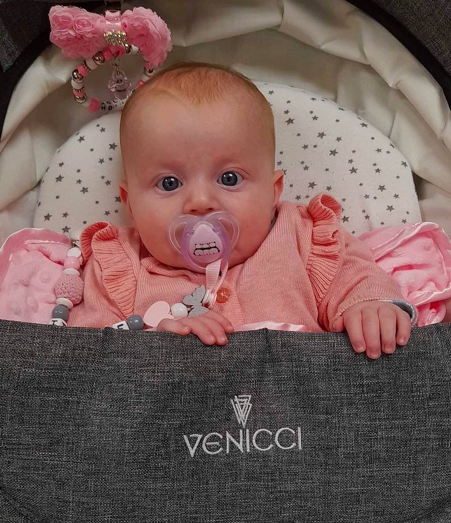 Hollie joined the competition — help win amazing prizes! baby, baby_safety, baby_sleeping, baby_toddler_clothing, cheek, chin, comfort, eye, facial_expression, happy, headgear, human_body, infant_bed, iris, linens, lip, mouth, person, pink, skin