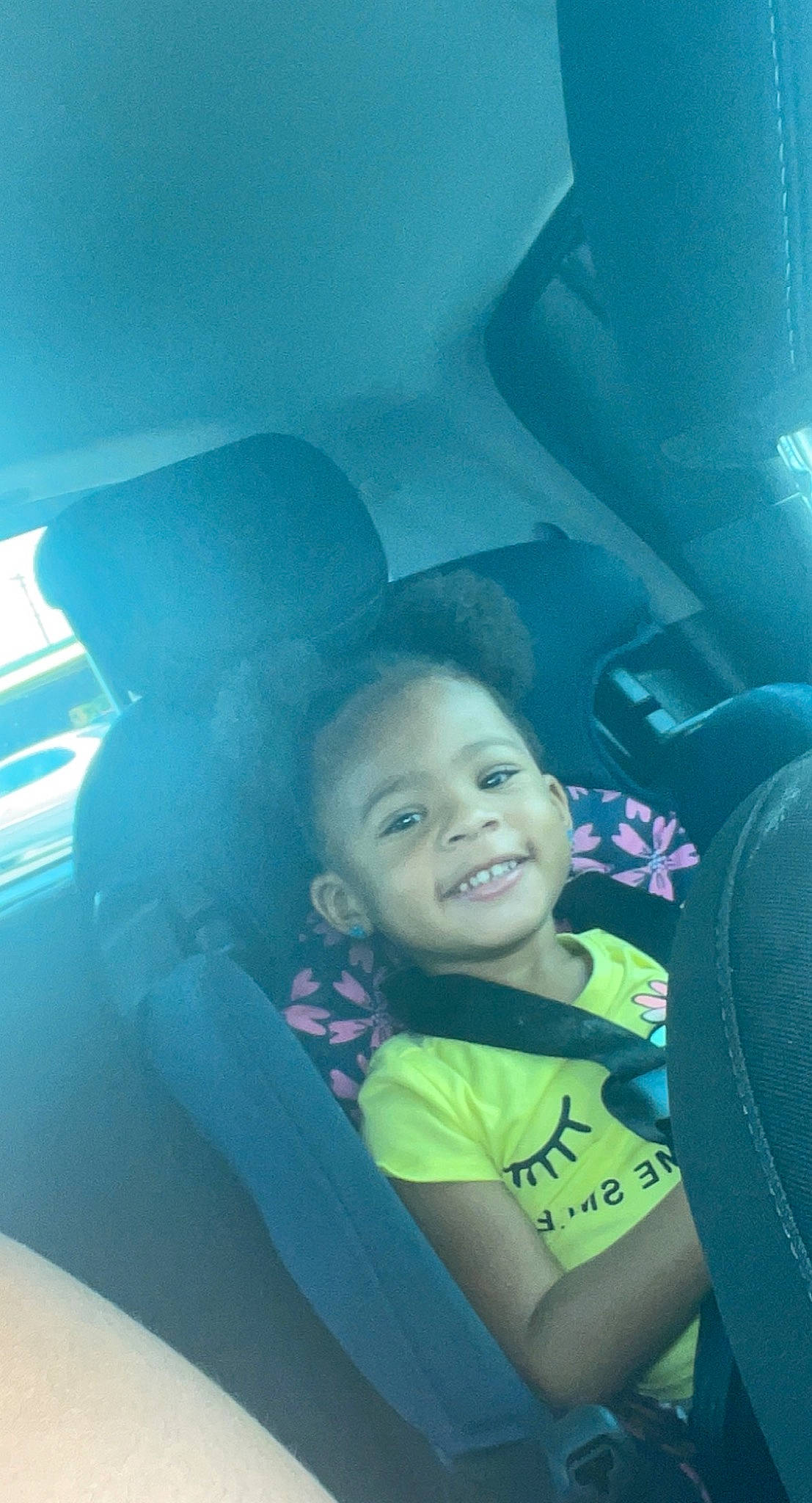 Bre'Lynn joined the competition — help win amazing prizes! auto_part, automotive_design, automotive_exterior, black_hair, car_seat, car_seat_cover, cloud, cool, face, flash_photography, fun, happy, head_restraint, iris, person, sky, smile, steering_part, tints_and_shades, toddler