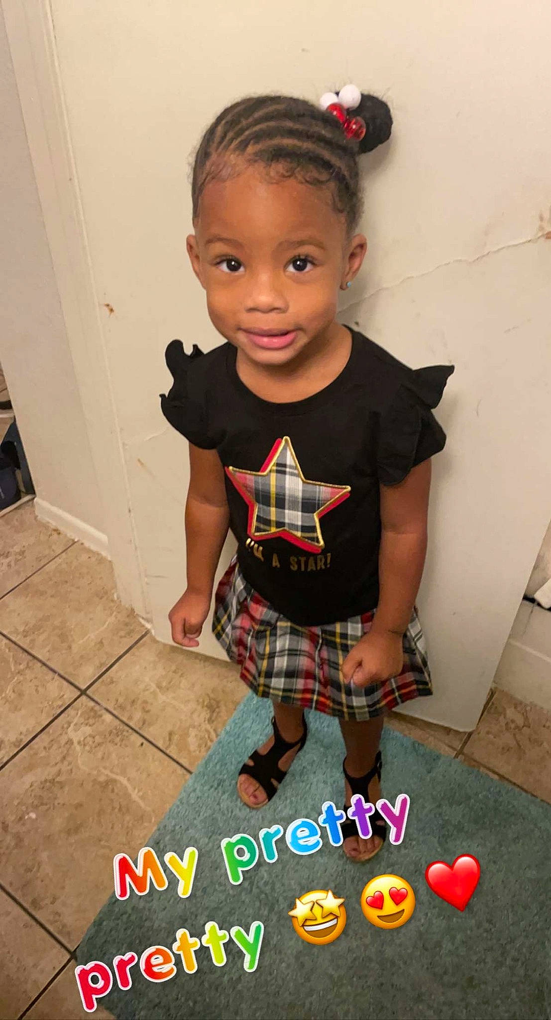 Bre'Lynn joined the competition — help win amazing prizes! baby_toddler_clothing, child, clothing, cool, dress, face, flooring, hair, happy, head, pattern, person, plaid, shorts, sleeve, smile, sock, t_shirt, tartan, toddler