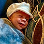Zayden joined the competition — help win amazing prizes! baby, smiling, blanket, hat, cushion, pattern, cozy, sleeping, infant, face, comfort, resting, cute, child, portrait, indoor, soft, warm, happy, closeup