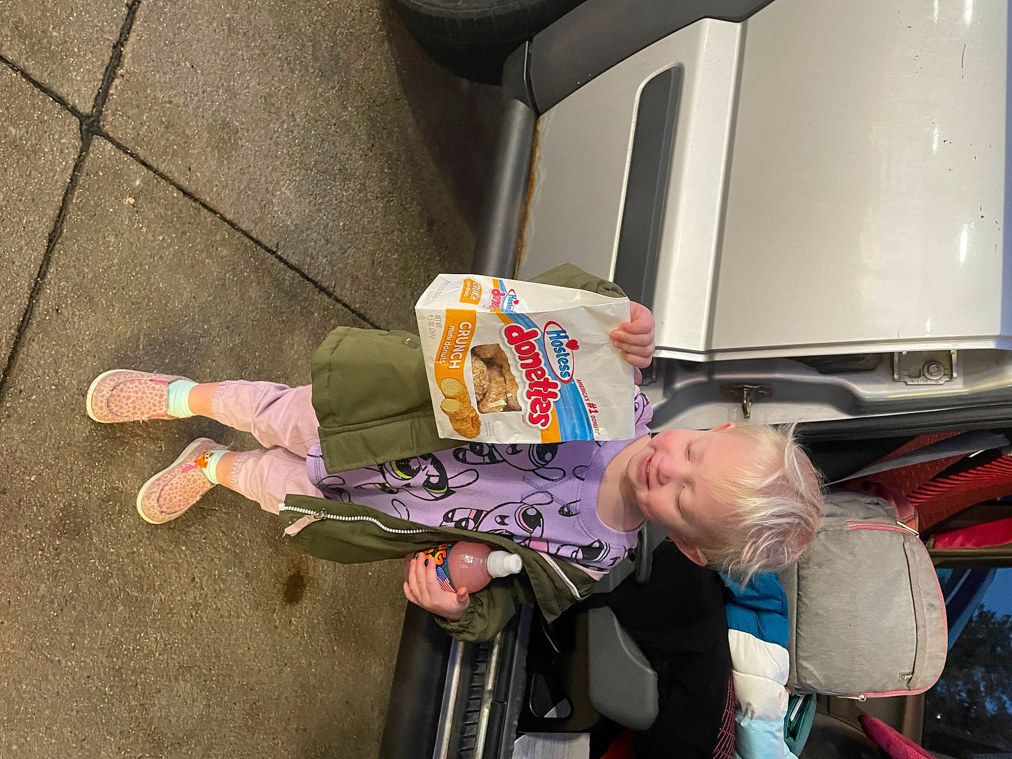 Eden joined the competition — help win amazing prizes! asphalt, auto_part, automotive_design, automotive_exterior, bumper, car, family_car, fun, human_leg, motor_vehicle, person, road_surface, sitting, tire, travel, trunk, vehicle, vehicle_door, wheel