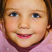 Aimy a rejoint le concours — aidez-le/la à gagner de superbes lots ! blue_eyes, child, closeup, cute, earring, expression, eyelashes, face, hair, happy, indoor, light, mouth, person, pink_shirt, portrait, skin, smiling, teeth, young