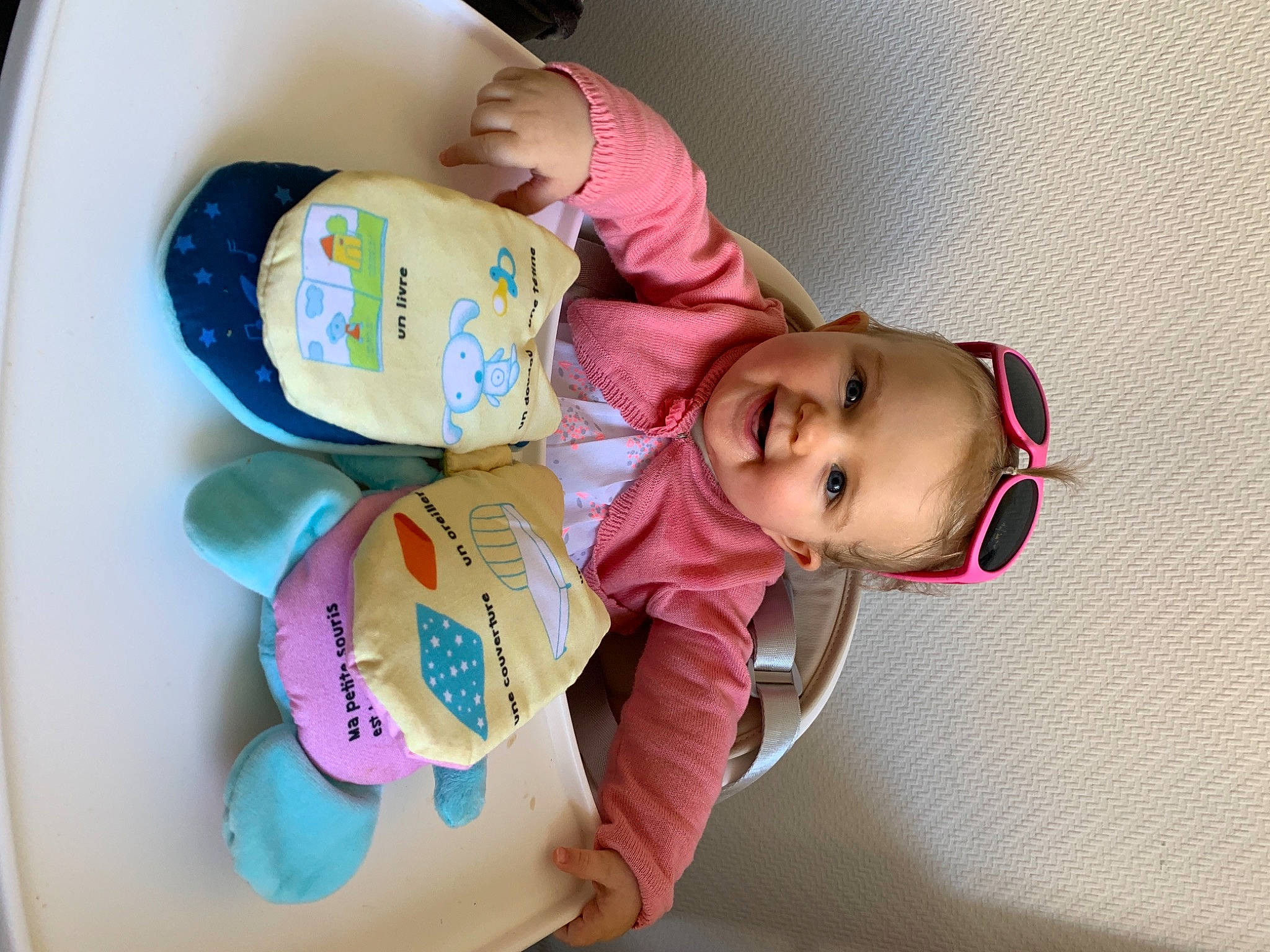 Aimy a rejoint le concours — aidez-le/la à gagner de superbes lots ! baby, baby_products, baby_toddler_clothing, chair, child, circle, comfort, food, fun, happy, hat, joy, magenta, person, pink, room, skin, smile, sweetness, tableware